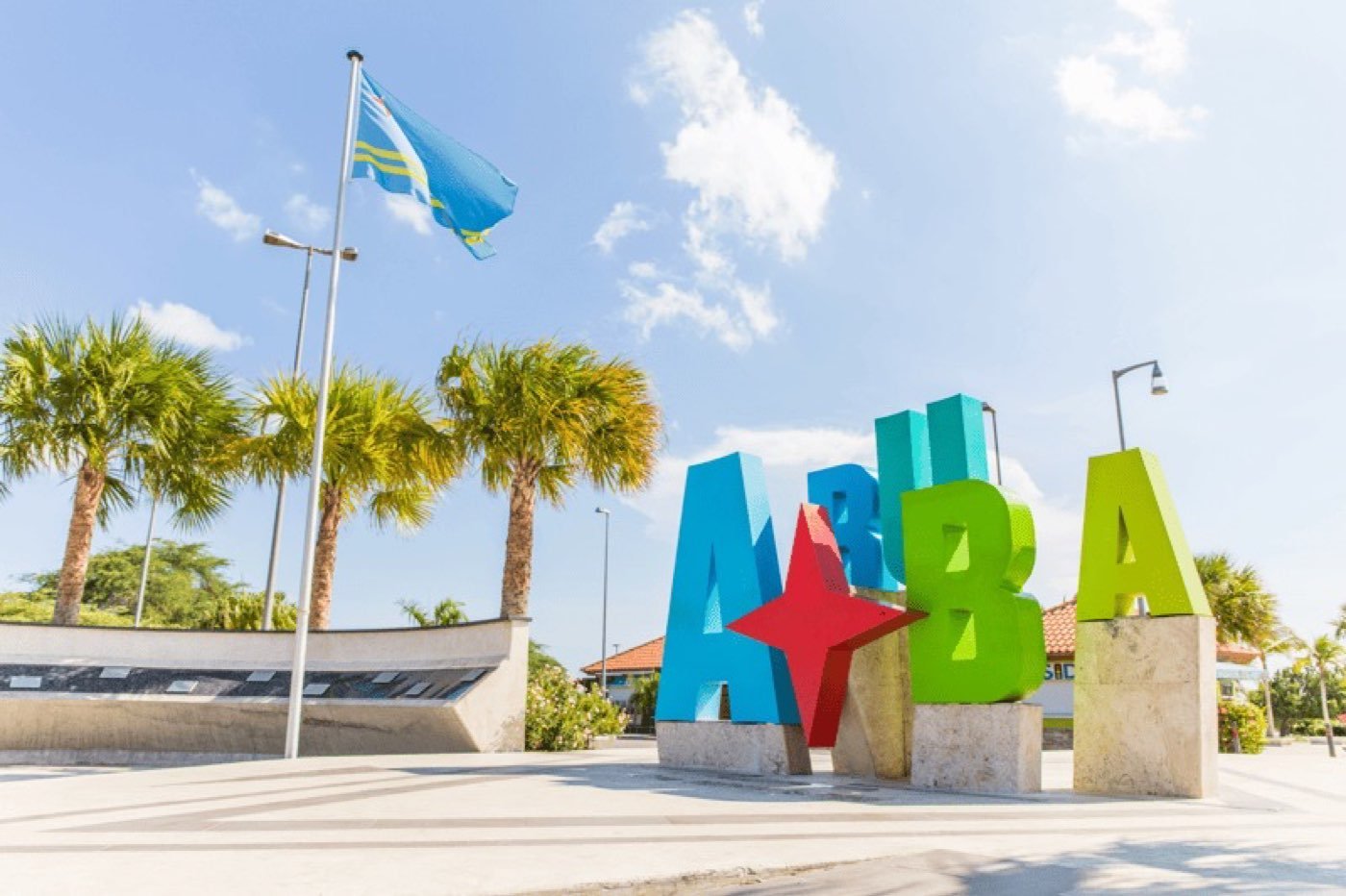 The colourful Aruba sign and flag on the Oranjestad waterfront